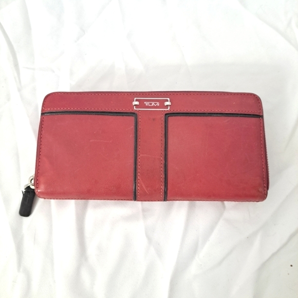 Tumi Handbags - Tumi | Red leather ladies Wallet and black trim